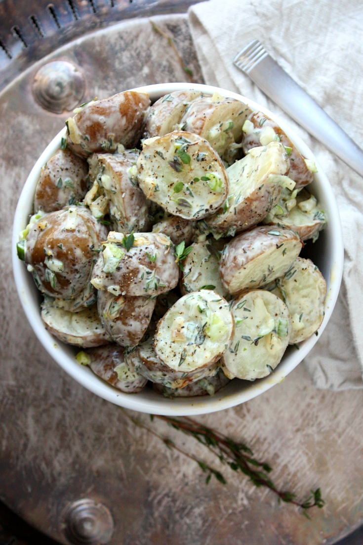 This simple potato salad with fresh thyme is my summer BBQ go-to when I'm in the mood for a hearty, filling side that takes minimal effort. Lighter that your classic potato and egg version, the fresh thyme is the star ingredient, transforming this dish into serve-worthy side.